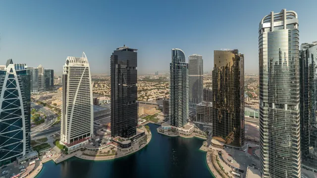 Aerial view of a modern skyline surrounding a marina