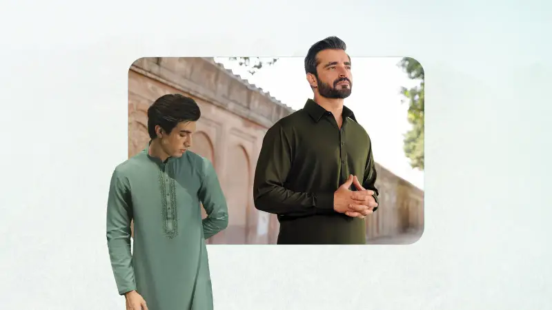 Two men in sage-green and olive-green kurtas posed against a sandstone wall